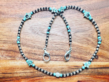 Load image into Gallery viewer, Hamsa Turquoise and black
