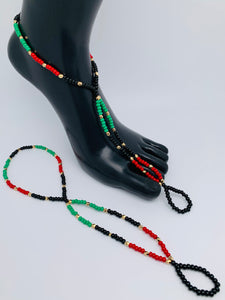 Red , black and  green barefoot sandals